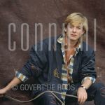 25-09-1985 Benny Neyman at location in  Amsterdam.

[keywords]Posed, Half Length, Eyecontact[/keywords]